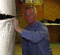 Owner - Dale - Inspecting a Basement Wall