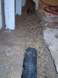 Replacing drain tile
