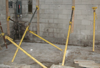 reinforcing basement wall with jacks